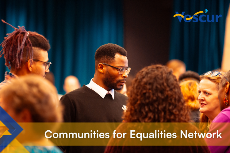 Image of people at a meeting, captioned "Communities for Equalities Network"